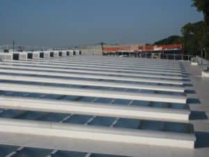 long glass industrial skylights - EXTECH's Custom Glass Skylights with PV Panels at DDC-DEP Remsen Avenue Yard in Brooklyn, NY