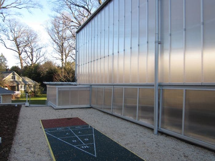 EXTECH's LIGHTWALL translucent wall system for a tennis enclosure