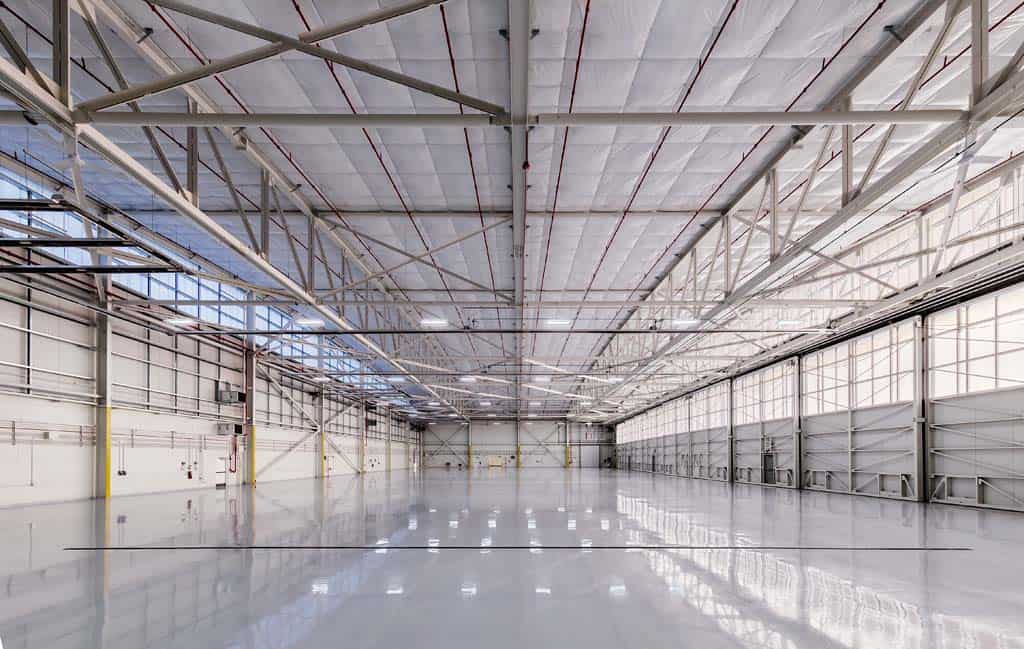 Industrial wall panels for aircraft hangar in Chicago - interior daylighting and durability