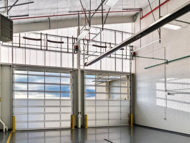 polycarbonate panels for airport hangars - EXTECH's LIGHTWALL 3440 & SKYGARD 3300 at Dupage Airport in Chicago, IL
