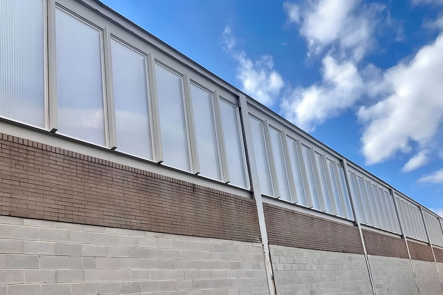 Exterior facade of the STORMTECH® 3200 & 3400 protective overglazing wall system with Polycarbonate Glazing.